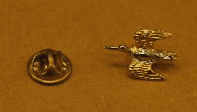 SPILLA CACCIA ANATRA PICCOLA IN VOLO COLORE ARGENTO E ORO